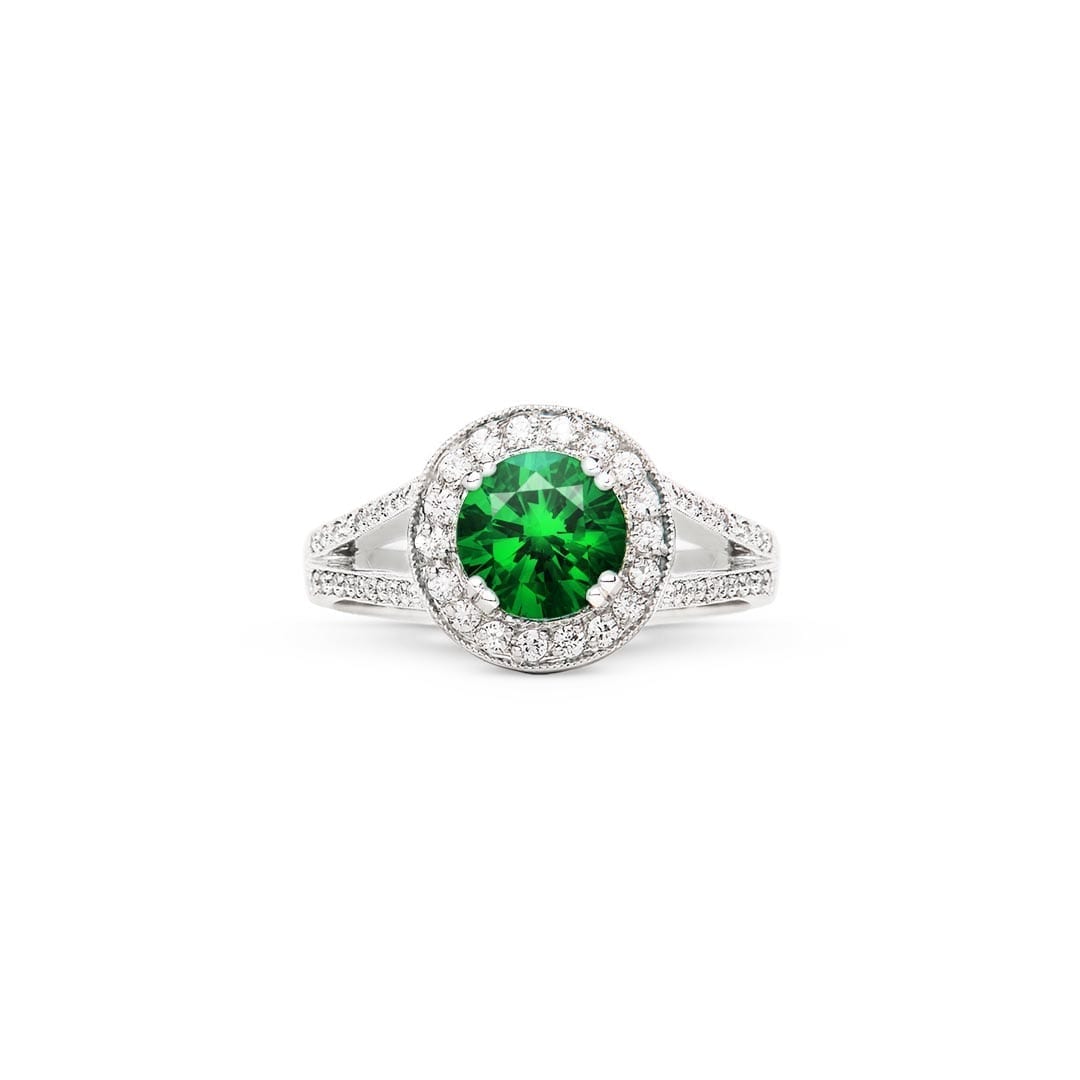 Green tsavorite garnet engagement ring with diamonds in white gold