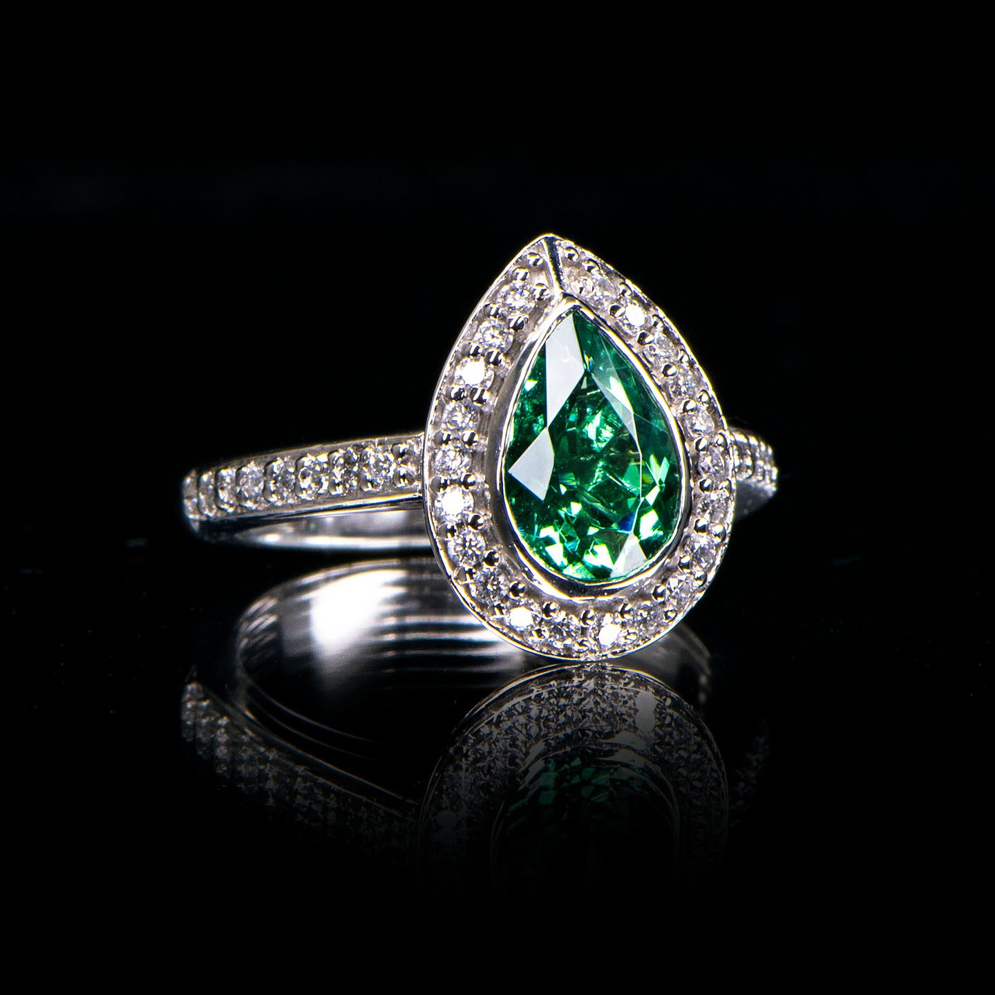 Emerald and diamond engagement or cocktail or anniversary ring in white gold